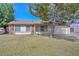 Charming single-story home with stone accents and well-maintained lawn at 7044 W Sierra St, Peoria, AZ 85345