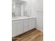 Bathroom featuring dual sinks, countertop, and stylish tile floors at 7449 W Buckhorn Trl, Peoria, AZ 85383