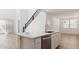 Bright kitchen featuring an island with stainless steel dishwasher and modern faucet at 7449 W Buckhorn Trl, Peoria, AZ 85383