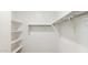 Walk-in closet with shelving and hanging rods, providing ample storage space at 7449 W Buckhorn Trl, Peoria, AZ 85383