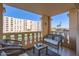 Inviting balcony with stylish seating offers a relaxing outdoor space with views of the complex at 7950 E Camelback Rd # 211, Scottsdale, AZ 85251