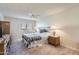 Comfortable bedroom with a ceiling fan, large window, and classic furnishings at 7950 E Camelback Rd # 211, Scottsdale, AZ 85251