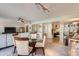 Open floor plan integrating dining area, living space, and adjacent kitchen at 7950 E Camelback Rd # 211, Scottsdale, AZ 85251