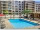 Enjoy the sunshine at the community's outdoor pool, surrounded by ample lounge chairs at 7950 E Camelback Rd # 211, Scottsdale, AZ 85251