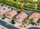 Aerial view of residential homes with private backyard pools and well-manicured landscaping at 835 E Virgo Pl, Chandler, AZ 85249
