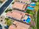 Aerial view showcasing a beautiful home with a private pool and landscaped backyard at 835 E Virgo Pl, Chandler, AZ 85249