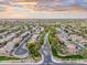 Expansive aerial view of a planned community featuring tree-lined streets and well-manicured green spaces at 835 E Virgo Pl, Chandler, AZ 85249