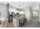 Bright modern kitchen with stainless steel appliances and an island with seating at 835 E Virgo Pl, Chandler, AZ 85249