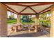 Community pavilion with picnic tables and shelter is an inviting space near a playground at 835 E Virgo Pl, Chandler, AZ 85249