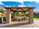Community pavilion with seating offers a comfortable space for gatherings and picnics in a lush, green setting at 835 E Virgo Pl, Chandler, AZ 85249