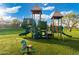 Community playground includes slides, climbing structures, and a spring rider for active fun in a well-maintained area at 835 E Virgo Pl, Chandler, AZ 85249