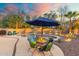 Backyard featuring a refreshing pool, patio seating, and mature landscaping for relaxing outdoor living at 835 E Virgo Pl, Chandler, AZ 85249