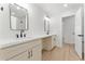 Bathroom features dual sinks, modern fixtures, and stylish mirrors at 8419 N 51St Dr, Glendale, AZ 85302