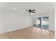 Bedroom with ceiling fan and sliding glass door to the pool at 8419 N 51St Dr, Glendale, AZ 85302