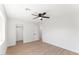 Light and bright bedroom features wood-look floors and a ceiling fan at 8419 N 51St Dr, Glendale, AZ 85302