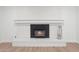 A detailed view of the cozy fireplace, ready for warmth and ambiance at 8419 N 51St Dr, Glendale, AZ 85302