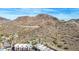 Aerial view of townhomes near a desert mountain, featuring unique architectural details and community layout at 9716 N 3Rd Dr, Phoenix, AZ 85021