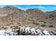 Aerial view of desert homes near a mountain, featuring unique architectural details, and beautiful desert landscaping at 9716 N 3Rd Dr, Phoenix, AZ 85021