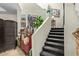 Finished basement features a bar area and a staircase to another level of the home at 9716 N 3Rd Dr, Phoenix, AZ 85021