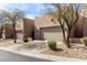 Charming home exterior with well-maintained landscaping, mature trees and a private drive at 9716 N 3Rd Dr, Phoenix, AZ 85021