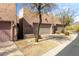 Charming home exterior with well-maintained landscaping, mature trees and a private drive at 9716 N 3Rd Dr, Phoenix, AZ 85021