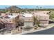 Attractive desert community homes featuring private garages, easy care landscaping, and a neutral color palette at 9716 N 3Rd Dr, Phoenix, AZ 85021
