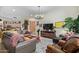 Spacious living room with stylish decor, comfortable seating, and a warm ambiance at 9716 N 3Rd Dr, Phoenix, AZ 85021
