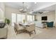 Bright living space showcases a seamless blend of dining and living areas, perfect for modern living at 9716 N 3Rd Dr, Phoenix, AZ 85021