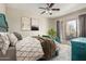 Cozy main bedroom with large bed, stylish furniture, and access to a balcony at 9716 N 3Rd Dr, Phoenix, AZ 85021