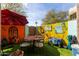 Outdoor patio with festive decor, a dining table, and colorful accents ideal for entertaining guests at 9716 N 3Rd Dr, Phoenix, AZ 85021