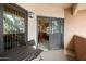 Cozy balcony with a table and chairs, perfect for enjoying the outdoors at 10030 W Indian School Rd # 203, Phoenix, AZ 85037