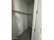 Walk-in closet features ample storage and neutral paint at 10035 S 23Rd Dr, Phoenix, AZ 85041