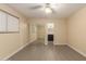 Bedroom showing tile flooring, closet, and bathroom access at 10713 N 36Th Ave, Phoenix, AZ 85029