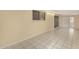 Expansive bonus room featuring tiled floors, neutral paint, and natural light at 10713 N 36Th Ave, Phoenix, AZ 85029