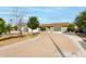 Charming single-story home with well-maintained front yard and a long concrete driveway at 10713 N 36Th Ave, Phoenix, AZ 85029