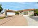 Charming single-story home with well-maintained front yard and a long concrete driveway at 10713 N 36Th Ave, Phoenix, AZ 85029