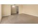 Bright living room featuring neutral paint, tile flooring, and open layout at 10713 N 36Th Ave, Phoenix, AZ 85029