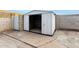 Backyard storage shed with double doors; great for storing lawn equipment and more at 10713 N 36Th Ave, Phoenix, AZ 85029
