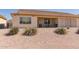 Backyard features low-maintenance landscaping and a covered patio, perfect for outdoor enjoyment at 10960 E Monte Ave # 131, Mesa, AZ 85209