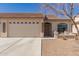 Charming single-story home featuring a two-car garage, covered entry and inviting front porch at 10960 E Monte Ave # 131, Mesa, AZ 85209