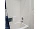 Clean white bathtub with white tiled walls and a shower curtain rod at 11411 N 91St Ave # 175, Peoria, AZ 85345