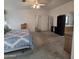 Spacious bedroom featuring a ceiling fan, carpeted floors, and vaulted ceiling at 11411 N 91St Ave # 175, Peoria, AZ 85345