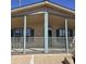 Charming home featuring a covered front porch with railing and a light-colored exterior at 11411 N 91St Ave # 175, Peoria, AZ 85345