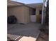 A covered patio area that includes the potential for a grill and an area for a pet at 11411 N 91St Ave # 175, Peoria, AZ 85345
