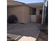 A covered patio area that includes the potential for a grill and an area for a pet at 11411 N 91St Ave # 175, Peoria, AZ 85345