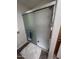 Modern shower featuring sleek sliding doors and contemporary fixtures at 11411 N 91St Ave # 175, Peoria, AZ 85345