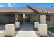 Inviting entrance featuring a brick walkway leading to the front door, complemented by lush greenery at 1323 E Whalers Way, Tempe, AZ 85283