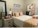 Cozy bedroom with decorative pillows and a modern patterned bedspread at 14250 W Wigwam Blvd # 812, Litchfield Park, AZ 85340