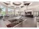 Spacious clubhouse with ample seating, modern decor, and large windows providing natural light at 14250 W Wigwam Blvd # 812, Litchfield Park, AZ 85340