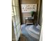 Charming patio features a decorative console table and a modern patterned rug at 14250 W Wigwam Blvd # 812, Litchfield Park, AZ 85340